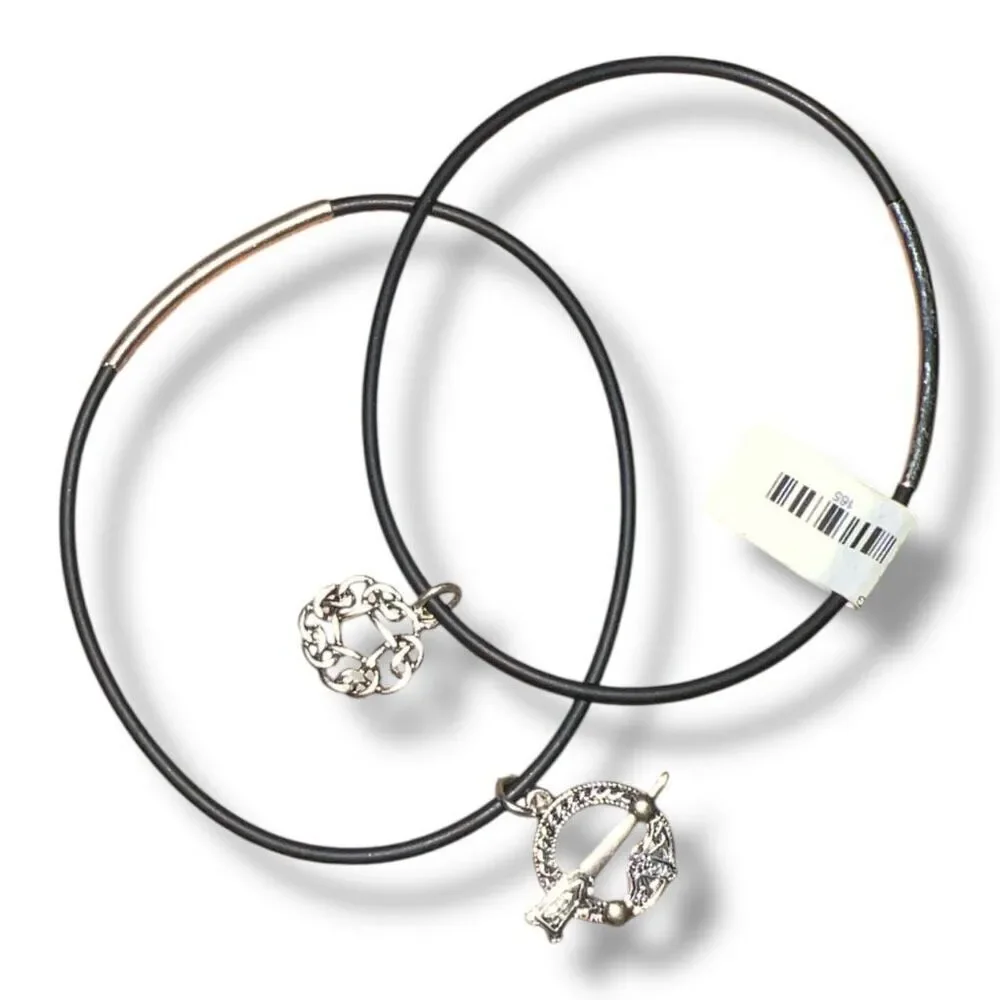 Set of Two Celtic-Inspired Black Jelly Bracelets with Silver Tone Charms